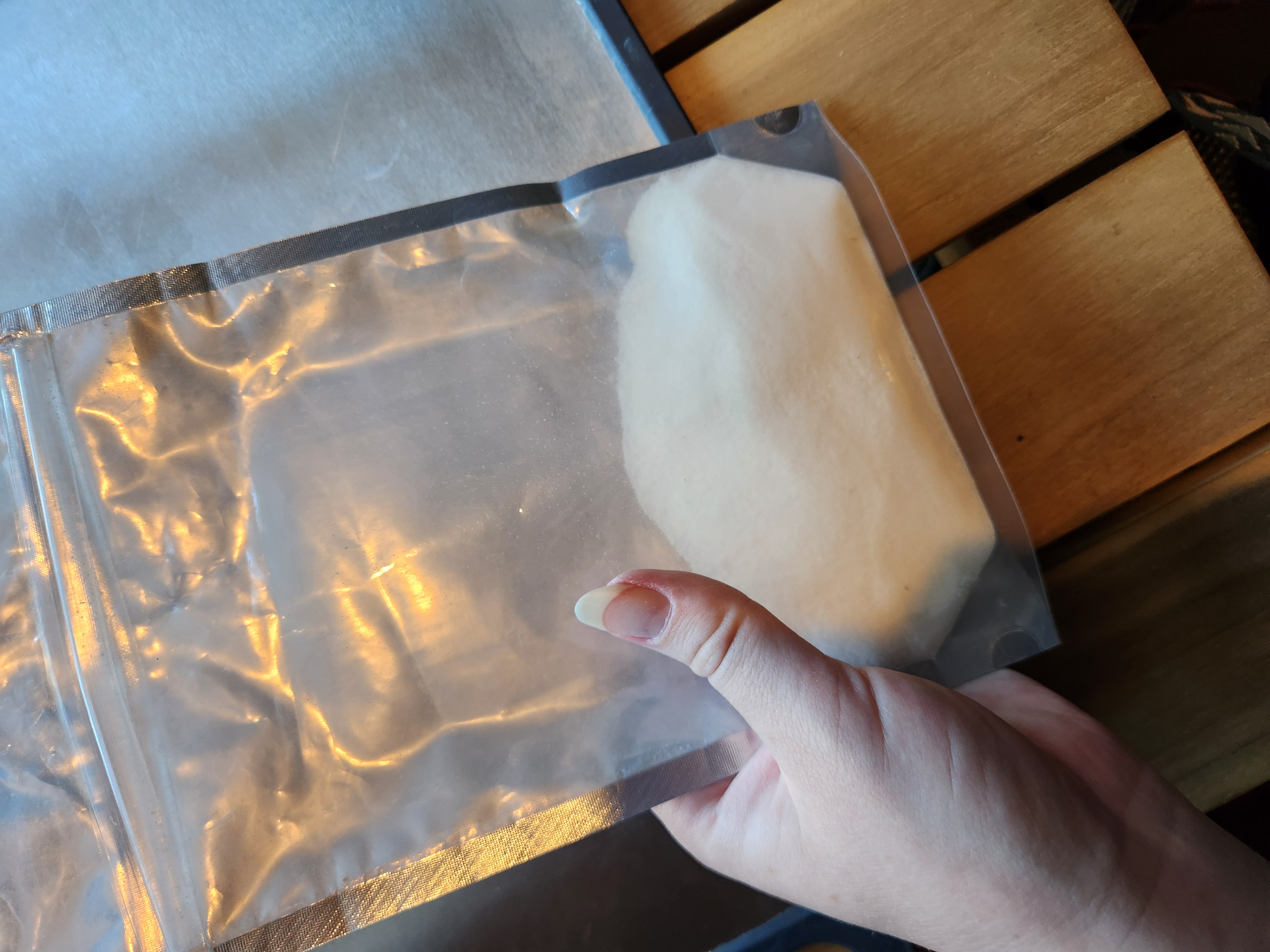 Back of the Green Shield Fire sample package showing the powdered hydrogel inside.